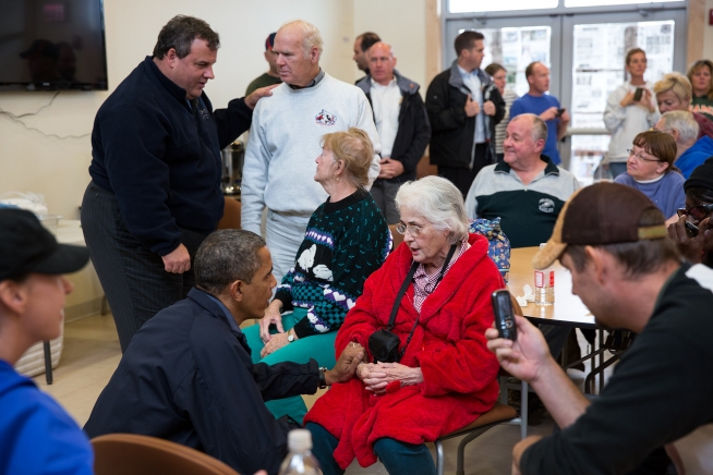 President Barack Obama and New Jersey Gov. Chris Christie talk with local residents at the Brigantine Beach Community Center in Brigantine N.J. Oct. 31 2012