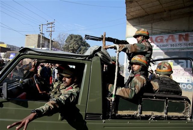 Indian army soldiers arrived Tuesday at the Indian air force base in Pathankot. Click