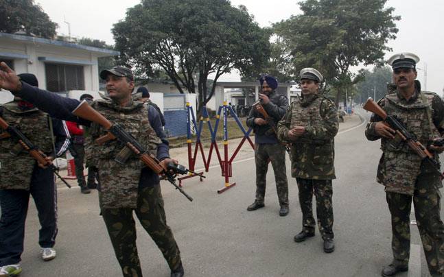 Indian security personnel stand guard inside the Indian Air Force base at Pathankot in Punjab