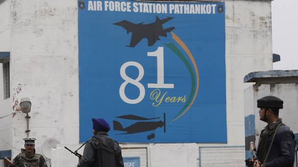 Indian soldiers stand guard outside an air base in Pathankot India