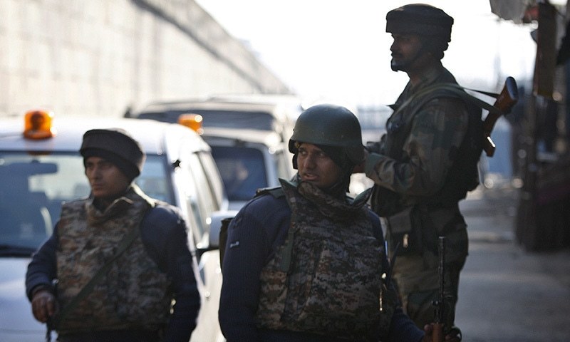 Indian soldiers stand outside an Indian air force base in Pathankot north of New Delhi India Saturday Jan 2 2016.-AP