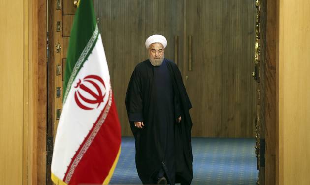 Iranian President Hassan Rouhani arrives for a news conference in Tehran Iran. The end of nuclear-related sanctions and the flurry of diplomacy that led to the release of Americans held by Iran suggests