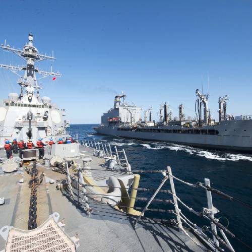 U.S. Navy guided-missile destroyer USS Bulkeley participates in a replenishment-at-sea with fleet replenishment oiler USNS John Lenthall in the Gulf of Oman. Iranian naval vessels conducted