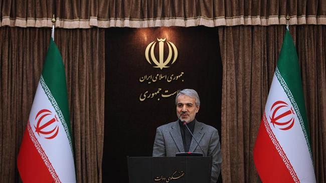 Iran’s government spokesman Mohammad Baqer Nobakht speaks to reporters in Tehran