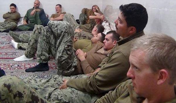 U.S. sailors are seen in an undisclosed location in Iran in this handout