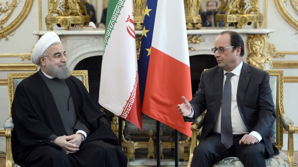 Iranian President Hassan Rouhani in a meeting with the the President of the French Senate Gerard Larcher held