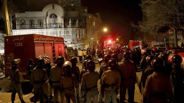 Iranian police and security forces stand guard to protect Saudi Arabia's embassy in Tehran as demonstrators protested against the execution of a Shiite cleric