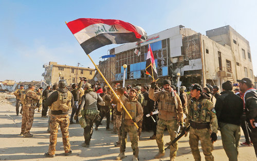 Iraqi Prime Minister vows to kick ISIS out of the country after troops recapture Ramadi