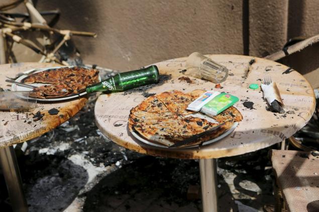 Pizzas are seen on the terrace of Cappuccino restaurant after the bloody gun attack