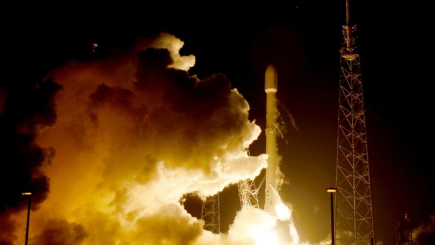 A remodeled version of the SpaceX Falcon 9 rocket lifts off from Cape Canaveral