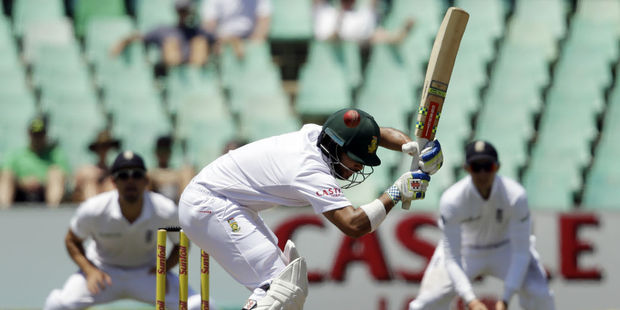 JP Duminy attempts to ducks under a bouncer