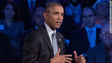 US President Barack Obama speaks at a town hall meeting with CNN's Anderson Cooper on reducing gun violence at George Mason University in Fairfax Virginia