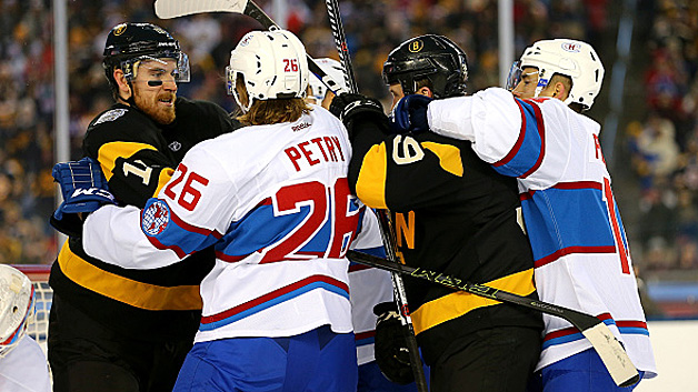 Jimmy Hayes and Jeff Petry of the Montreal Canadiens fight in the third period