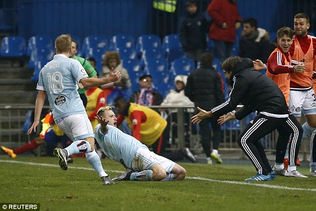 Jubilant celebrations on the touchline as the Celta players celebrate John Guidetti's goal