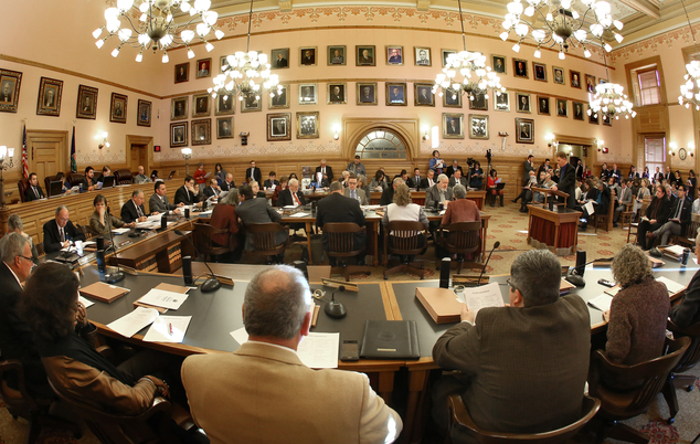 The old state Supreme Court room in the state Capital is full Wednesday Jan. 13 2016 as State Budget director Shawn Sullivan presents the governor¿s budge