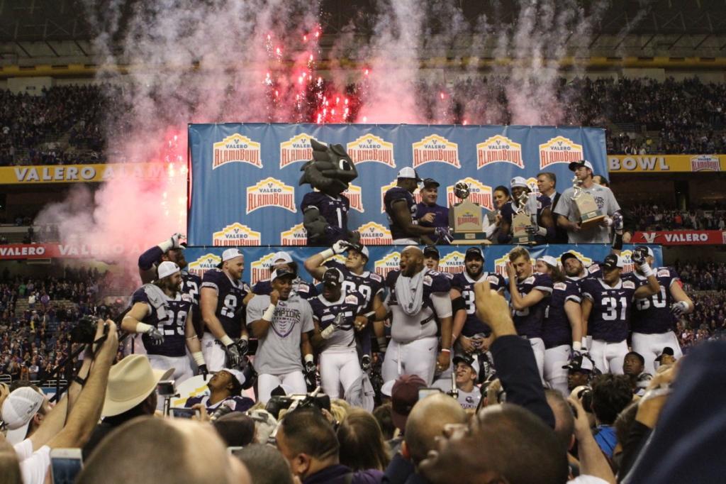 TCU players celebrate the team's 47-41 comeback victory over Oregon in the Alamo Bowl