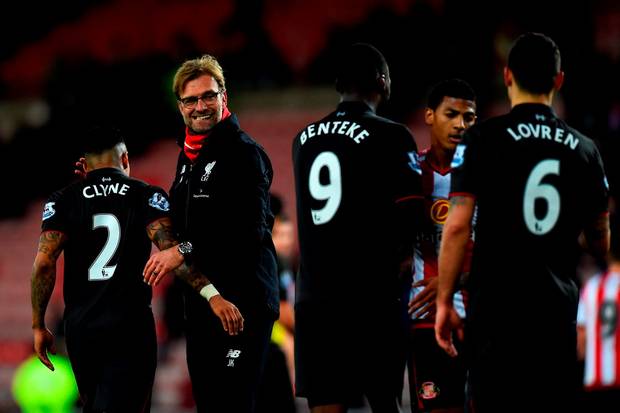 SUNDERLAND ENGLAND- DECEMBER 30 Jurgen Klopp manager of Liverpool congratulates his players after the Barclays Premier League match between Sunderland and Liverpool at Stadium of Light