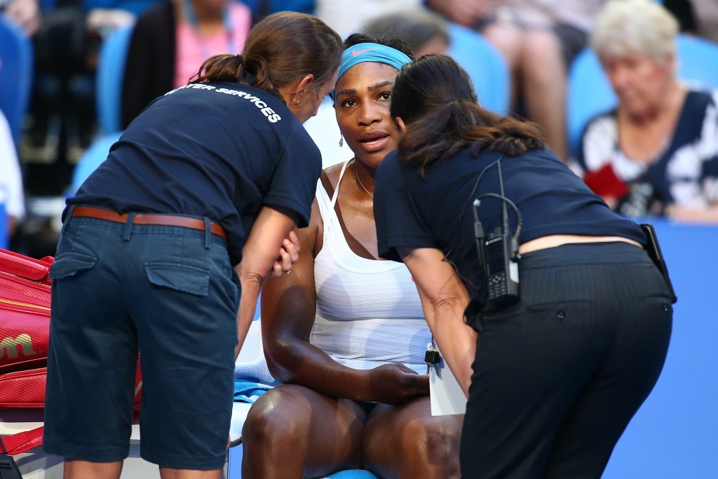 Serena Williams was forced to retire from her Hopman Cup match through injury as her American team suffered defeat to Australia Gold