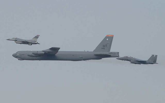 A United States Air Force B-52 Stratofortress from Andersen Air Base Guam conducted a low-level flight in the vicinity of Osan South Korea in response to recent provocative action by North Korea on Saturday. The B-52 was joined by a ROK F-15K Slam Eagl