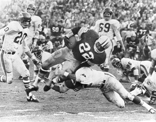 Green Bay Packers&#039 Klijah Pitts goes over right tackle to the Kansas City Chiefs&#039 five-yard line for a six-yard gain before being brought down by Kansas City's Johnny Robinson in the fourth quarter