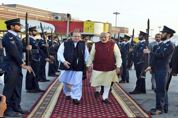 Narendra Modi walks with Nawaz Sharif in Lahore on 25 December. Sharif has directed Pakistan’s national security adviser Nasser Khan Janjua to remain in contact with his Indian counterpart Ajit Doval in a bid to keep the renewed dialogue on track after