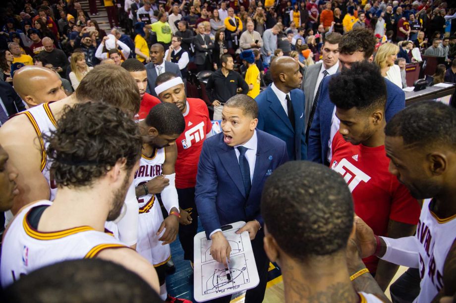 Tyronn Lue was the man in the middle for the Cavs in Saturday's game against the Bulls- his first as Cleveland's coach after David Blatt was fired Friday