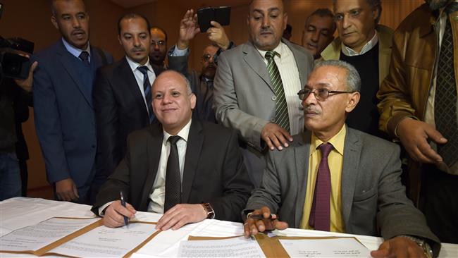 Libya’s internationally recognized House of Representatives signing documents after reaching an agreement on ending the political deadlock in Libya