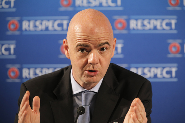 Gianni Infantino gestures during a press conference one day prior to the UEFA EURO 2016 quali