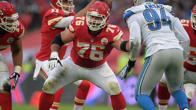 Nov 1 2015 London United Kingdom Kansas City Chiefs offensive linemen Jah Reid, Laurent Duvemay Tardif and center Mitch Morse defend against Detroit Lions defensive end Ezekiel Ansah during game 14 of the NFL International Series