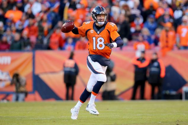 Peyton Manning throws for 227 yards as he finds himself back in the AFC Championship game against a familiar foe in Tom Brady and the Patriots