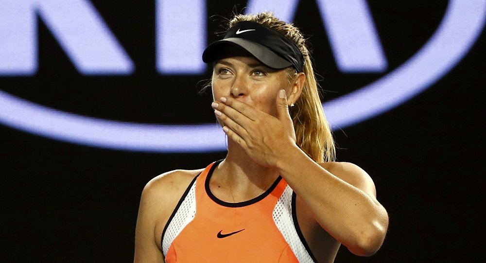 Russia's Maria Sharapova celebrates after winning her second round match against Belarus Aliaksandra Sasnovich at the Australian Open tennis tournament at Melbourne Park Australia