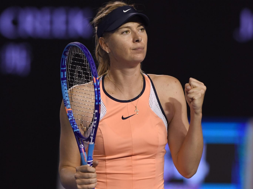 Maria Sharapova celebrates her third round victory over Lauren Davis Getty Images