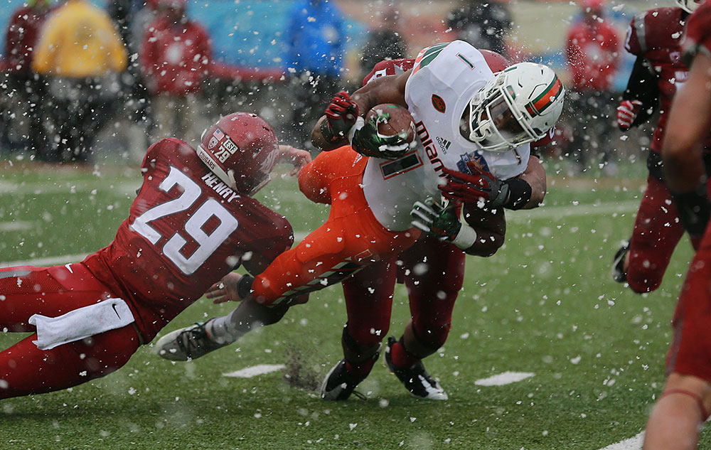 Mark Walton and the Hurricanes fell short in their Sun Bowl loss to Washington State