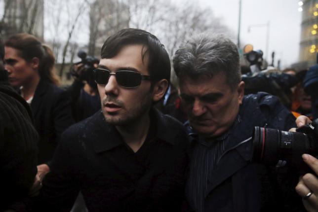 Martin Shkreli, chief executive officer of Turing Pharmaceuticals and Kalo Bios Pharmaceuticals Inc departs U.S. Federal Court after an arraignment following his being charged in a federal indictment filed in Brooklyn relating to his management of hed