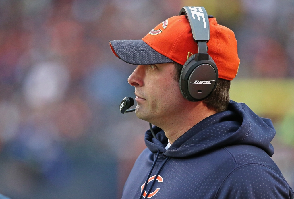 CHICAGO IL- DECEMBER 13 Offensive coordinator Adam Gase of the Chicago Bears watches as the Bears take on the Washington Redskins at Soldier Field