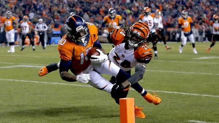 Denver Broncos wide receiver Emmanuel Sanders left scores a touchdown