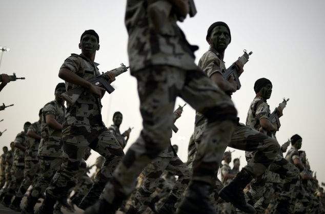 Members of the Saudi special police unit march during a military parade in Mecca