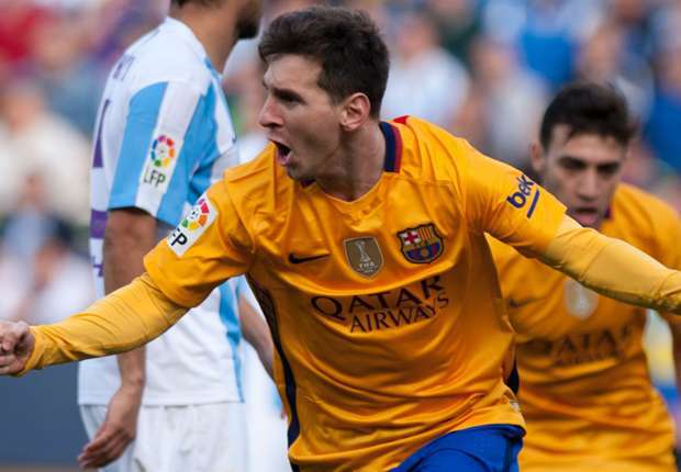 Barcelona's Lionel Messi celebrates his goal at Malaga