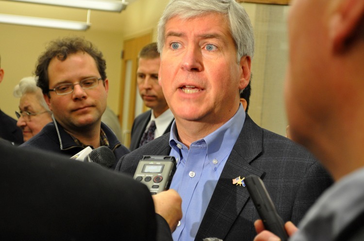 Michigan Gov. Rick Snyder is at the center of criticism over a public health crisis in Flint where a state decision to switch the city’s water source ended with lead-contaminated water. Here he speaks to the Michigan Municipal League in 2011