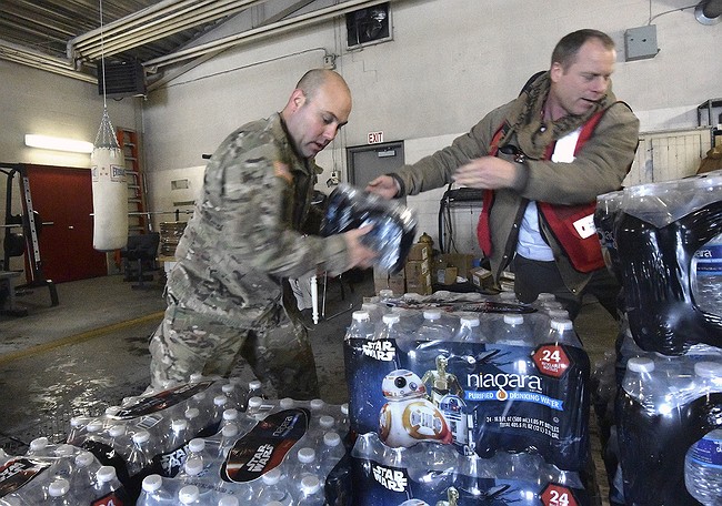 Deadly Disease Strikes After Cost-Cutting Contaminated Flint's Water Supply