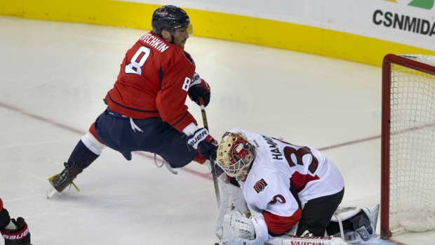 Andrew Hammond saves a shot from Alex Ovechkin