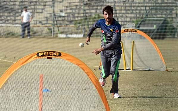 Mohammad Amir practises in the nets in Lahore