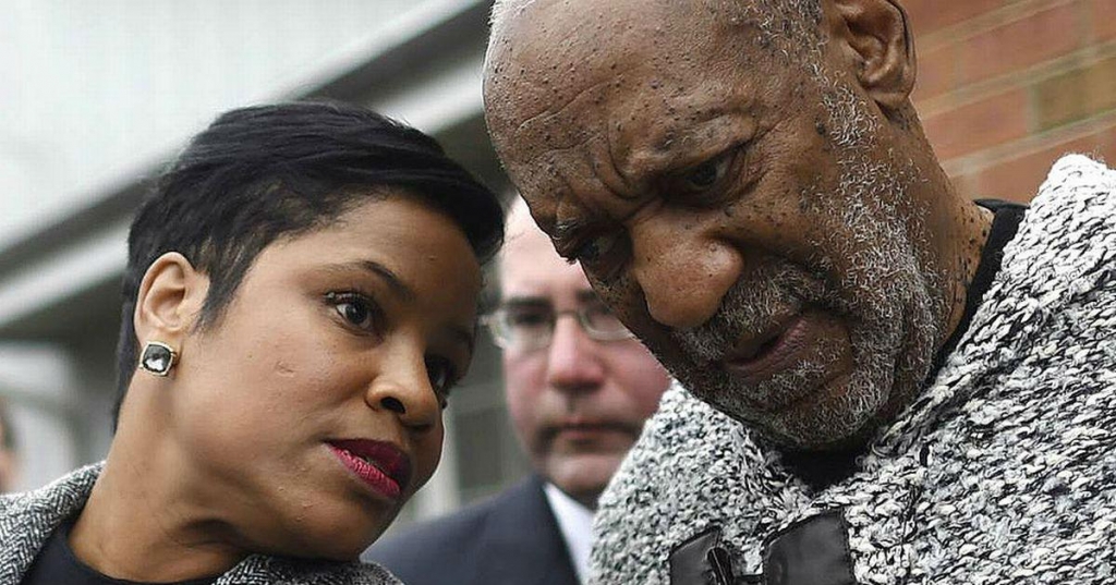 Monique Pressley and Bill Cosby out the Pennsylvania courtroom on Wednesday Getty