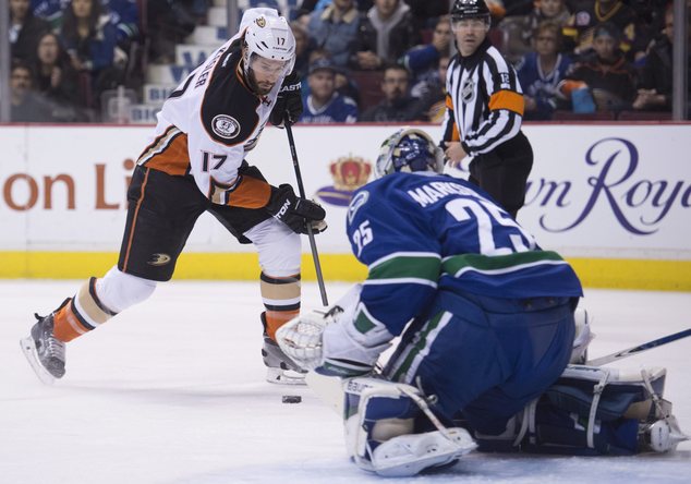 Anaheim Ducks center Ryan Kesler tries to get a shot past Vancouver Canucks goalie Jacob Markstrom during the first period of an NHL hockey game