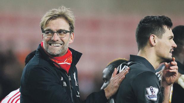 Juergen Klopp celebrates his team’s win against Sunderland at the Stadium of Light