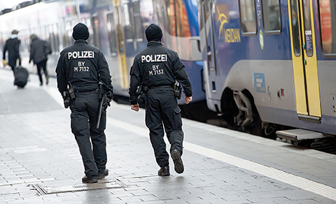 Police patrol at the main railway station in Munich southern Germany Saturday Jan. 2 2016. Police are maintaining a heightened presence following warnings of a planned attack on New Year's Eve