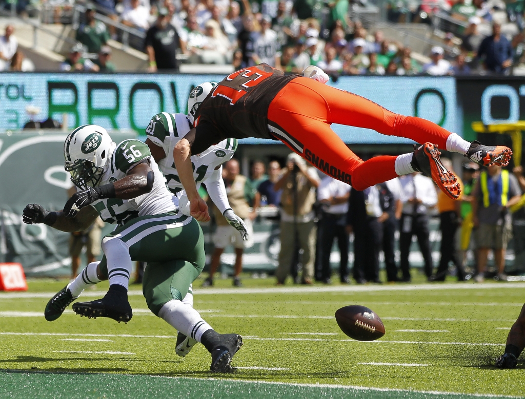 Browns quarterback Josh McCown center fumbles at the goal line after being hit by the Jets&#039 Demario Davis during the first quarter at Met Life Stadium on Sept. 13 2015