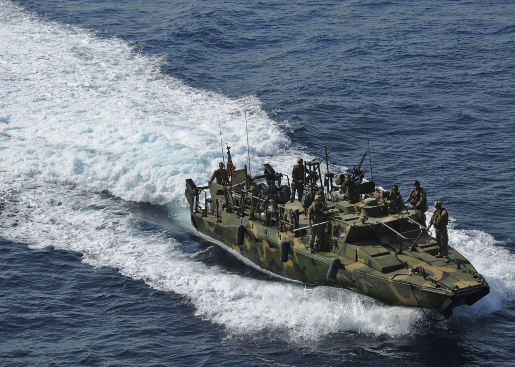 A riverine command boat from Riverine Detachment 23 operates during a maritime air support operations center exercise in the Persian Gulf in this