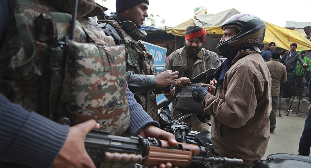 Indian security personnel check people entering an airbase in Pathankot India Monday Jan. 4 2016