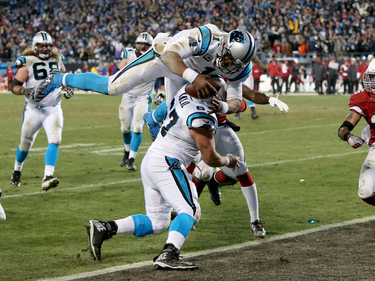 Cam Newton dives in after a 12-yard run for his second touchdown